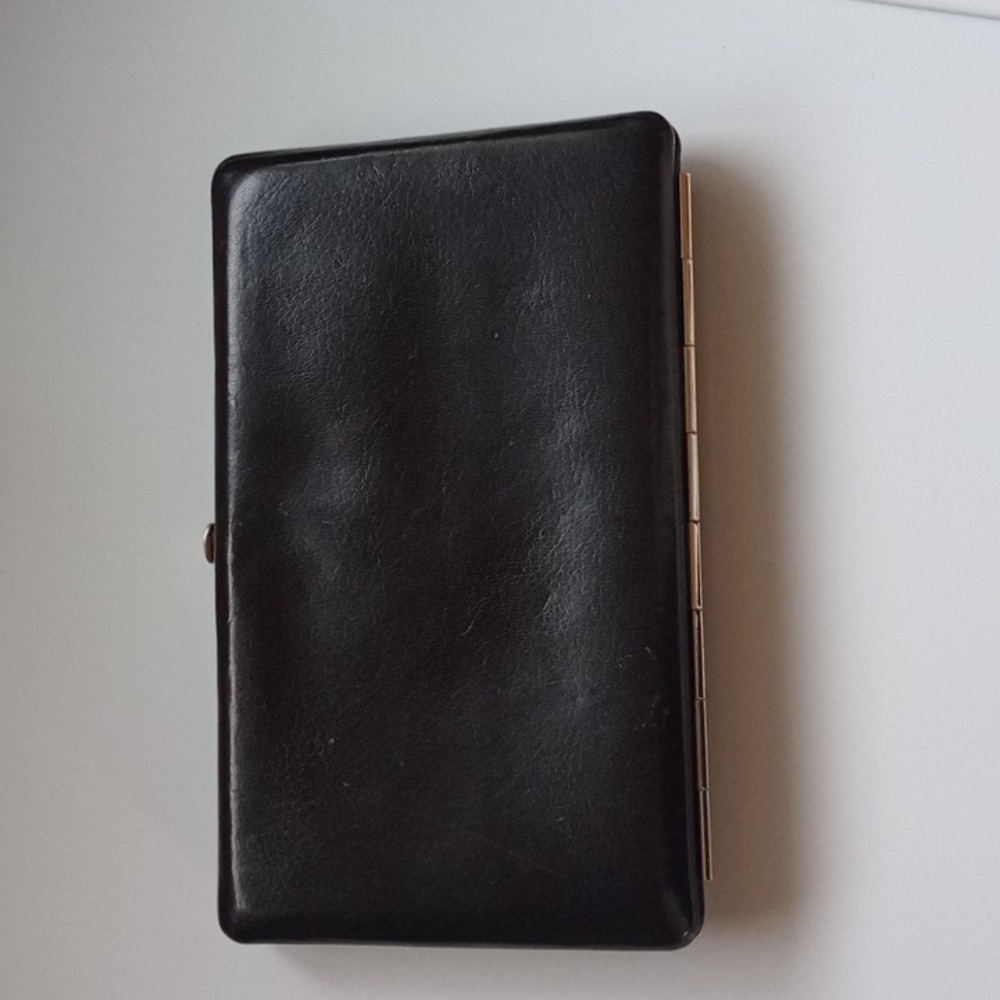 Abas Black Leather Silver Clutch With Clasp Closer And Card Slots.